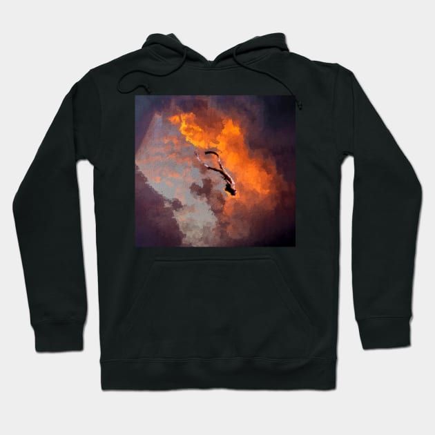 Woman diving in cloudy sky during sunset Hoodie by DigitPaint